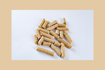 Wood Pellet Cat Litter isolated on white background.