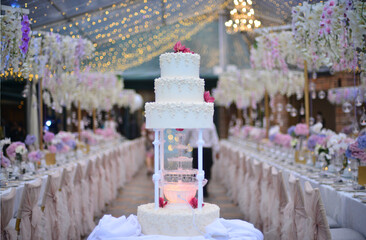 luxury color wedding solemnisation dinner flower florist , dinnerware, cloth and lighting decoration design in hotel and beach