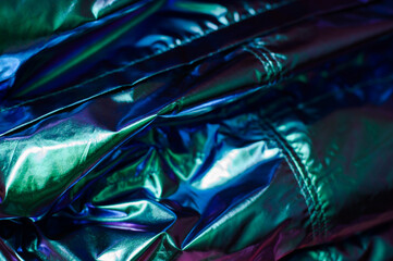 Holographic real texture in trendy colors with scratches and irregularities. Holographic color...