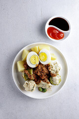 Siomay a dumpling traditional Indonesian food with peanut sauce. 