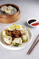 Siomay a dumpling traditional Indonesian food with peanut sauce. 