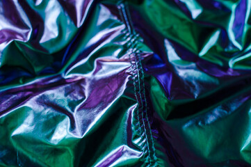 Holographic real texture in trendy colors with scratches and irregularities. Holographic color...