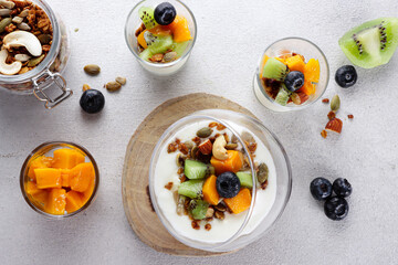 Homemade granola with yogurt and fresh fruits. 