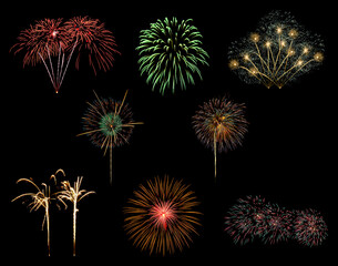 Variety of colorful fireworks isolated on black background