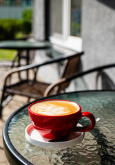 cup of cuppuccino in the red cup