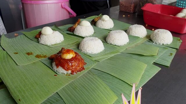 Nasi Lemak Wrapped In Banana Leaf.