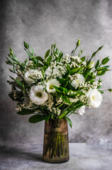 Beautiful white eustoma flowers in bouquet