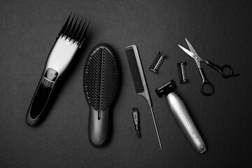 Fototapeta premium Equipment, tools for barber salon on black background