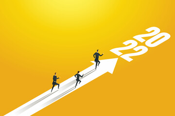 Group of business people running on arrows towards goals for 2022.