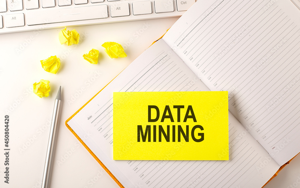 Poster data mining text on sticker on the diary with keyboard and pencil