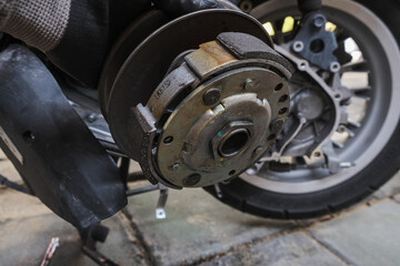 Fototapeta na wymiar Motorcycle CVT transmission gear fixing enngine close up