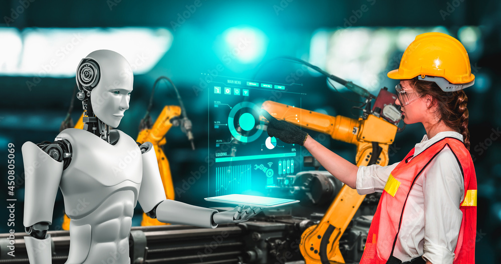 Wall mural Mechanized industry robot and human worker working together in future factory . Concept of artificial intelligence for industrial revolution and automation manufacturing process . - Wall murals