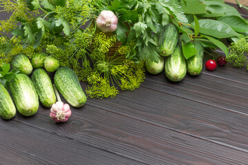 Cucumbers, dill and cherry sprigs, garlic and cherry berries.