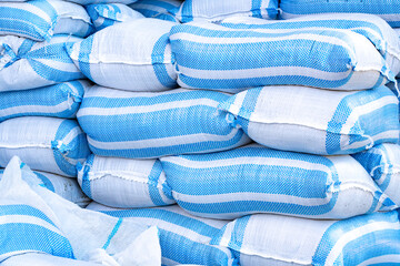 sandbags neatly stacked in rows