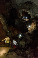 Myanmar (formerly Burma). Kayin State (Karen State). Hpa Han. People rush into the depths of Saddar or Sadan cave