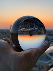 person holding a globe