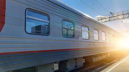 A car on the railway, in the rays of the sun. Travel, tourism.