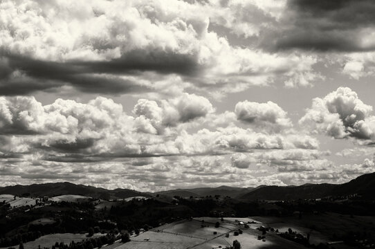 photo in retro style. landscape of sky and mountains, black and white photo, graininess. High quality photo