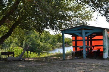 A gazebo for relaxing on the river bank.