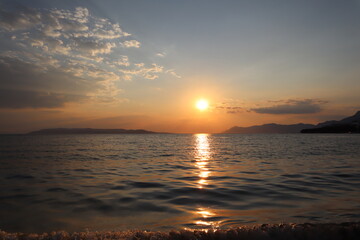 Picturesque landscape of the sunset on the sea on a sunny summer evening, Croatia