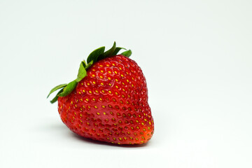 Ripe strawberry on white background