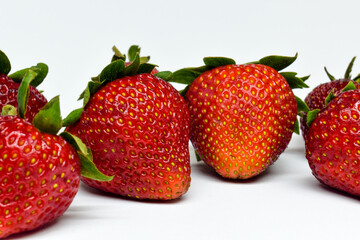 Strawberries on light background