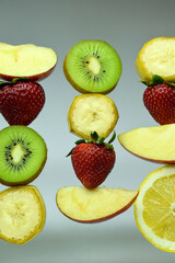 Set of exotic fruits. Banana, strawberry, kiwi, lemon and apple