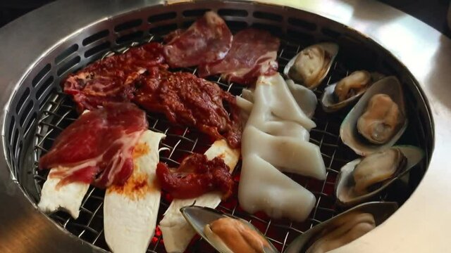 Asian BBQ-Style.  sliced meat and grill hot pan