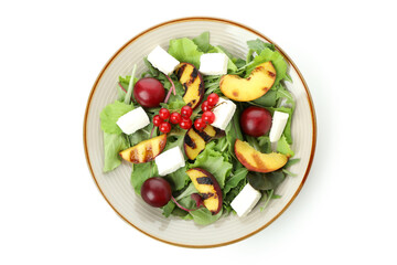 Salad with grilled peach isolated on white background
