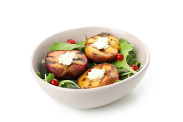 Salad with grilled peach isolated on white background