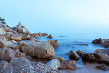 rocks on the beach in Spain, water flow