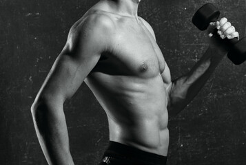 Fototapeta na wymiar sports man inflated torso posing black and white photo fitness