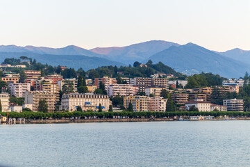 Fototapeta premium Lake promenade City of Lugano with sunrise sky, Travel in Switzerland