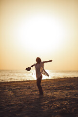 Silhouette of the Woman with Ukulele on the Beach Summer Vacation
