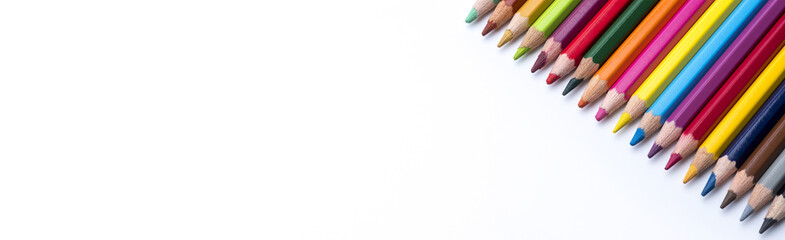 Fototapeta premium Colorful pencils and place for text on white background. Education concept and back to school concept.Top view.