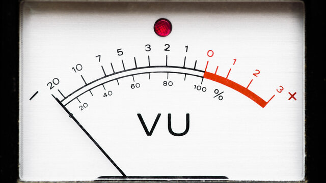 An analog VU meter with red overload led, and -20 to +3 decibel scale
