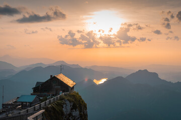 View from the top of Schafberg mountain looking down towards Mondsee and other lakes of upper Austria during a beautiful summer sunset.