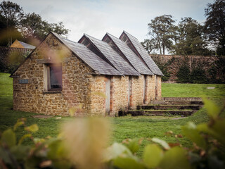 Obraz premium chicken coop old stone buildings