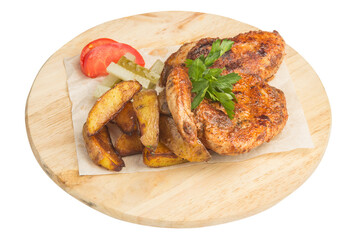 fried meat with potatoes and vegetables