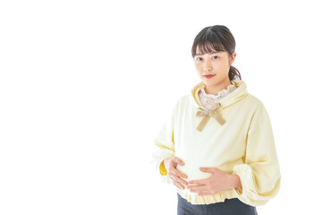 私服姿の若い妊婦の女性