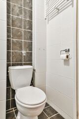 Interior of small clean washroom in miniature style