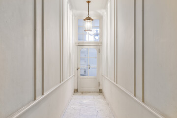 A long empty corridor designed in minimalistic style