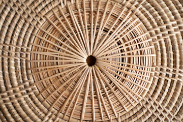 Close up to Round Circle woven straw mat Wicker pattern of local Thai handmade craft.