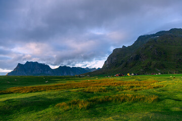 Obraz premium View on the Unstad village and mountains, Lofoten, Norway