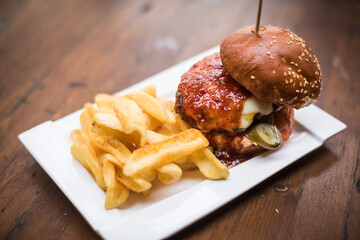 Hamburger on a plate, with french fries