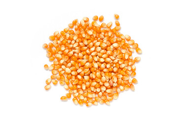 Top view of dry organic corn seed pile on white background. For healthy food ingredient or agricultural product concept