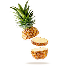 Fresh juicy tropical fruit pineapple flying isolated on white background.