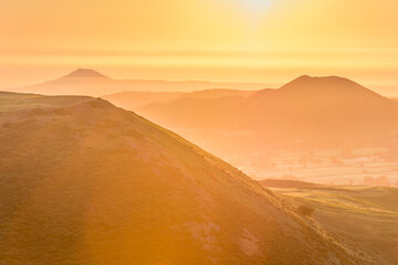 Fototapeta na wymiar Warm yellow sunrise in Shropshire Hills, UK