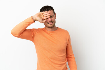 Brazilian man over isolated white background with tired and sick expression