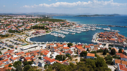 Tribunji small city near Vodice, Croatia. Stunning views on the city based on the small island and turquoise sea